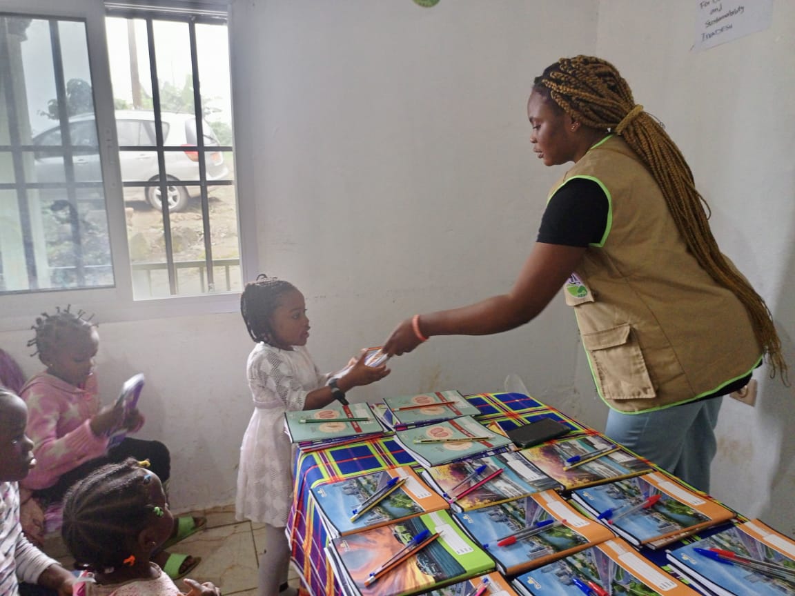 Children receiving school supplies ahead of the new academic year